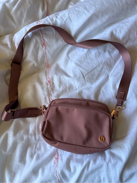 lululemon athletica Handbags - lululemon athletica Mauve Crossbody Bag with Rose Gold Hardware